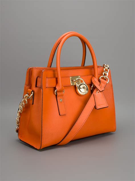 michael kors orange bag tote|Michael Kors orange bag.